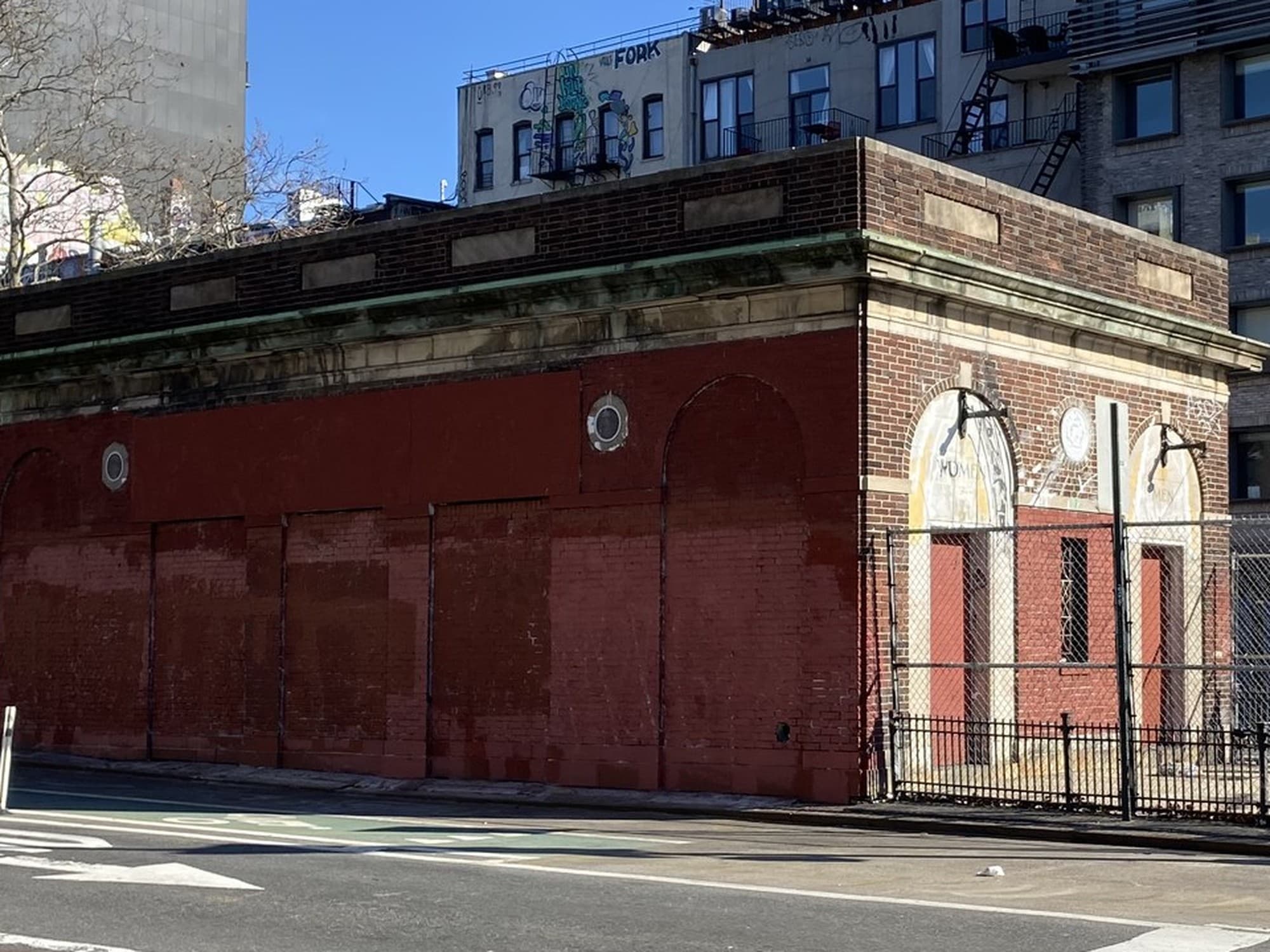 The building today, vacant and fenced off at the corner of Allen and Delancey Streets
